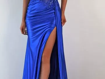 fun and vibrant electric blue mermaid prom dress with slit