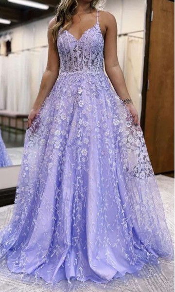 Light purple long prom gown with sheer corset bodice and floral appliqué