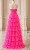 Showstopping hot pink chiffon prom dress with a ruched sweetheart bodice and a dramatic tiered ruffled skirt HPPD706