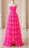 Showstopping hot pink chiffon prom dress with a ruched sweetheart bodice and a dramatic tiered ruffled skirt HPPD706
