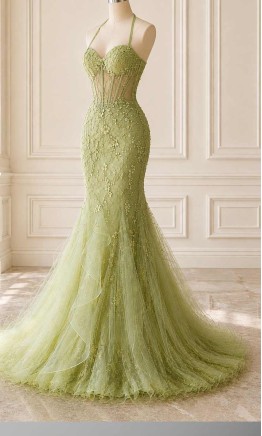 Breathtaking sage green tulle mermaid prom dress with a sheer corset bodice and romantic 3D floral details