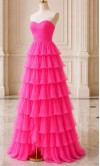 Showstopping hot pink chiffon prom dress with a ruched sweetheart bodice and a dramatic tiered ruffled skirt HPPD706