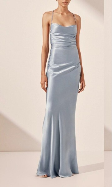 Elegant dusty blue satin bridesmaid slip dress with cowl neckline, ruched waist, and backless cross-strap tie adjustable